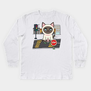 Cute Siamese cat is skate boarding on the street Kids Long Sleeve T-Shirt